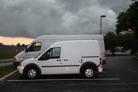Waiting white vans designed to transport dissidents to their new residences.They have also been seen traveling through select neighborhoods ...