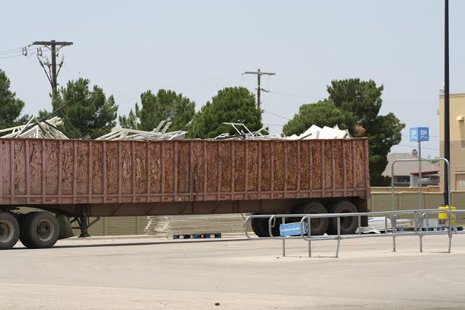 As photographed by Marlon Brock in early June, massive amounts of shelving is being hauled away from the Walmart store in Midland, Texas.