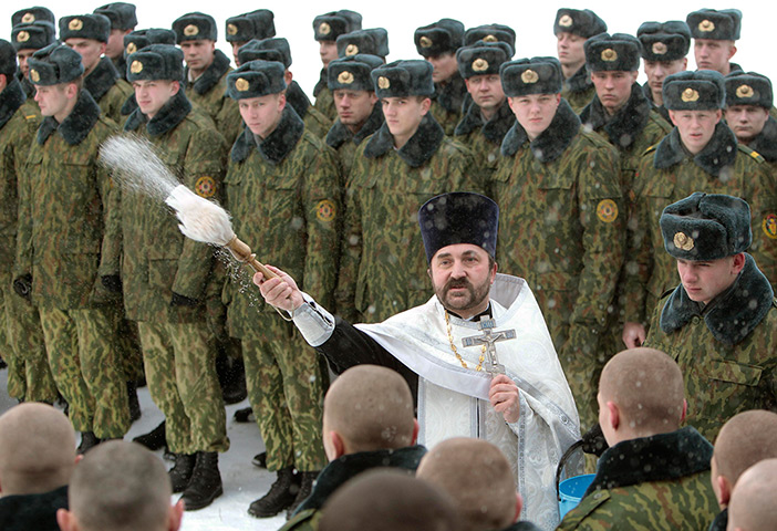 The Russian military embraces their Christian faith.